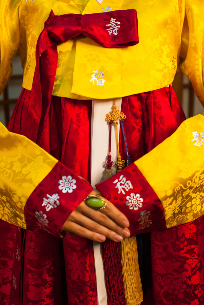 http://www.usasiajournal.com/wp-content/uploads/2021/03/A-woman-in-hanbok-posed-in-a-traditional-manner-Copyright-to-Photographer-Studio-Hongbanjang-Korea-Tourism-Organization-1-683x1024.jpg