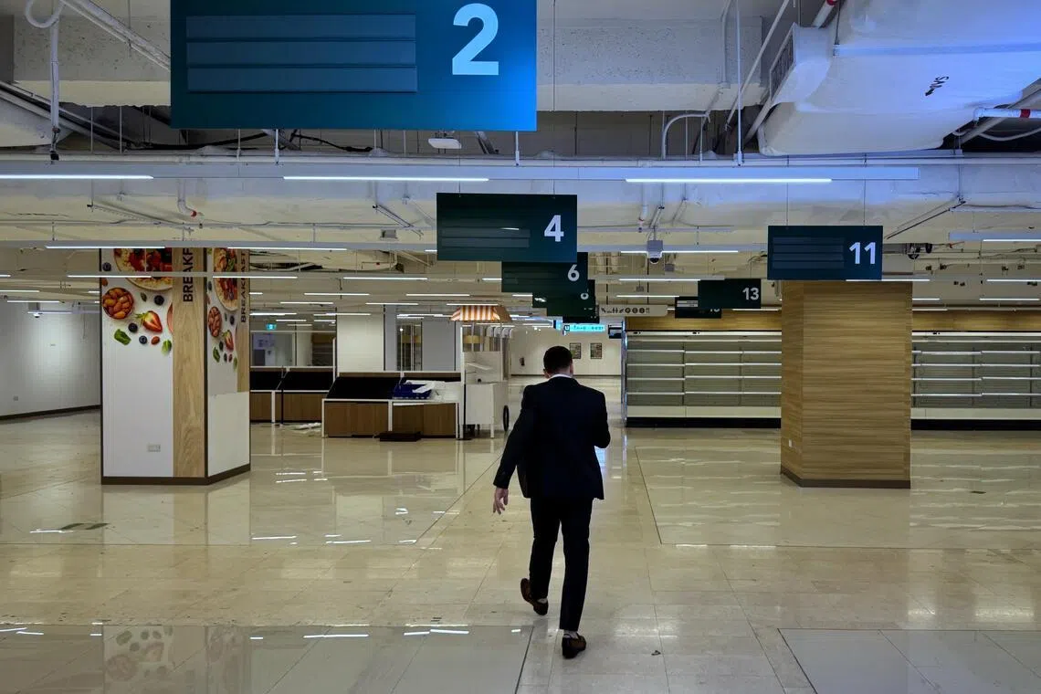 Empty spaces and shelves at Taste Orchard after Hao Mart ceased operations, seen on Dec 11, 2025.