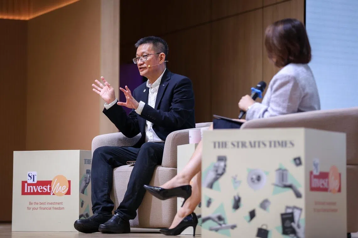 Mr Tan Ooi Boon (left), Invest editor at The Straits Times, answers questions at ST InvestMe’s first financial literacy event, Retire With More Money, with MONEY FM 89.3 presenter Ms Lynlee Foo moderating.