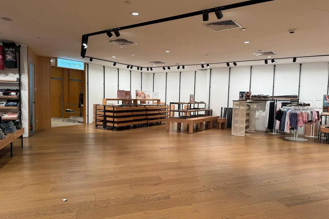 racottonon02 - Some shelves were already emptied and mannequins undressed when ST visited Serangoon NEX’s Cotton On outlet on July 1. ST PHOTO: ROSALIND ANG
