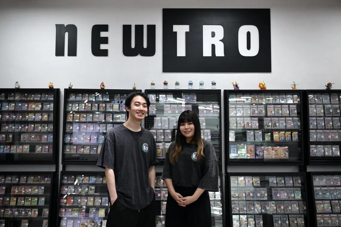 Dillon Sim and Audrey Low, co-founders of Newtro Gaming Studios, says it is business as usual at their trading card shop on the 14th floor.