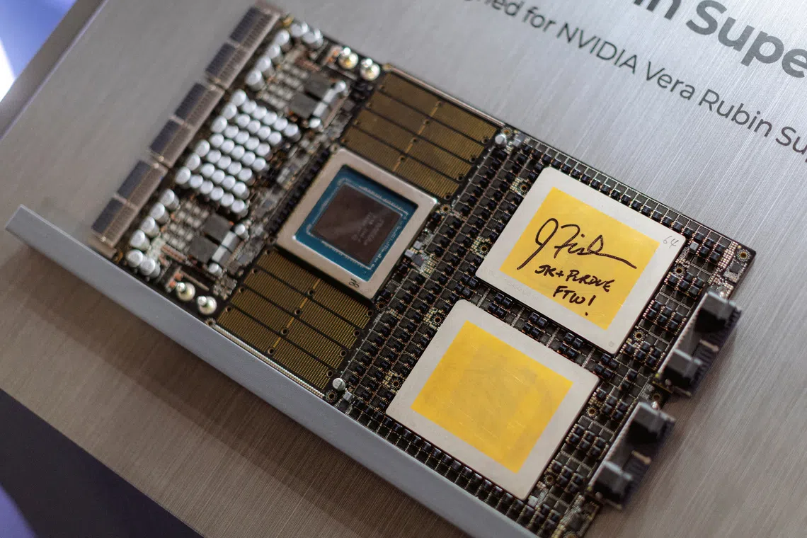 An example of a semiconductor chip sits at a display booth at the groundbreaking event hosted by SK Hynix and Purdue University.