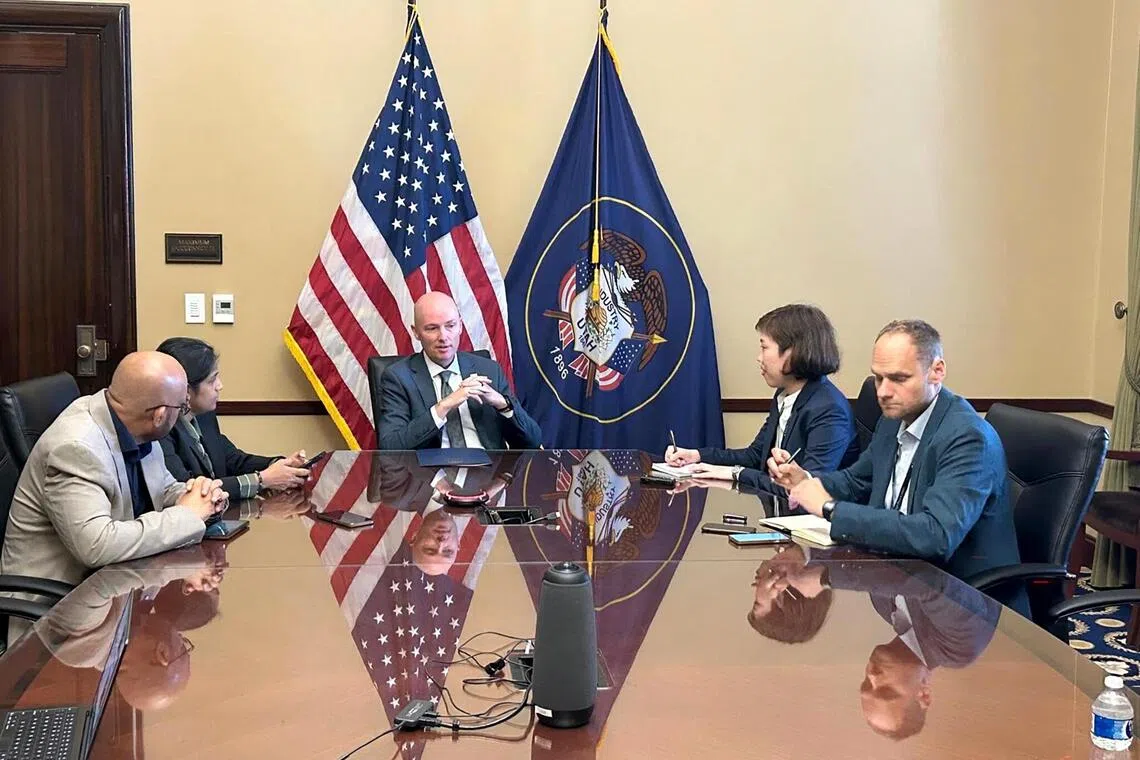 Utah governor Spencer Cox (centre) said Singapore businesses will face low regulation offered by other US states, but get more attention from officials.