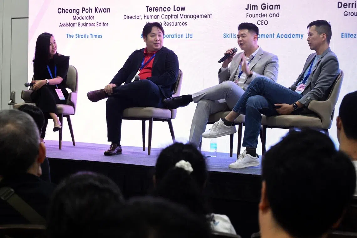 (From left) ST Assistant Business Editor Cheong Poh Kwan moderating a panel with SMRT director of human capital management Terence Low, Skills Development Academy founder and chief executive Jim Giam, and Elitez Group chief executive Derrick Teo.