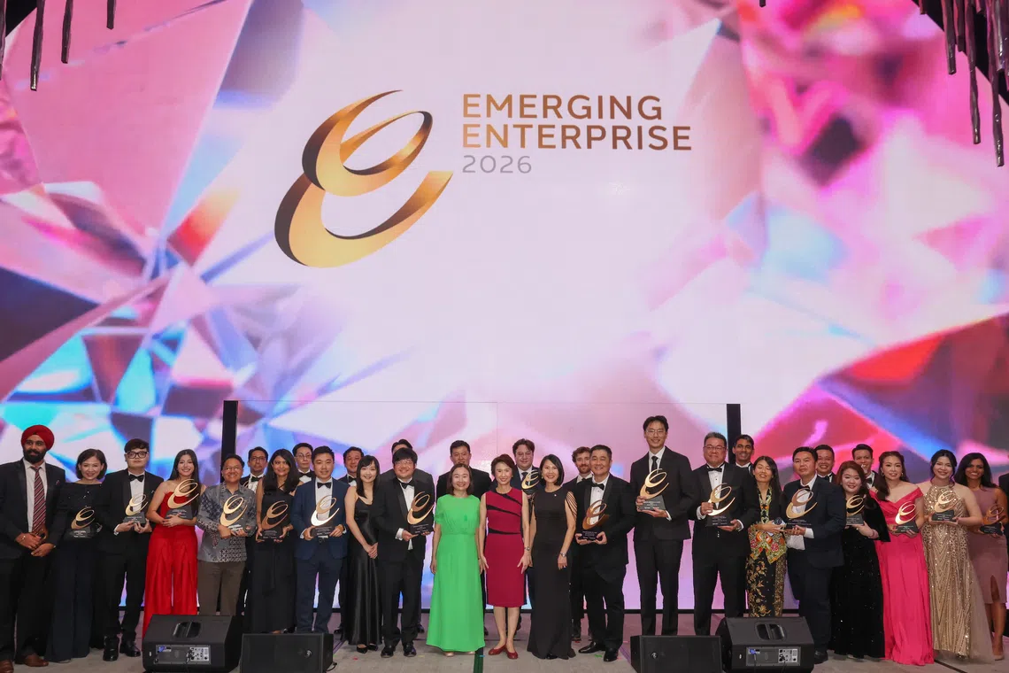 Award winners and finalists at the Emerging Enterprise Awards 2026, with Senior Minister of State for Energy, Trade and Industry Low Yen Ling (centre).